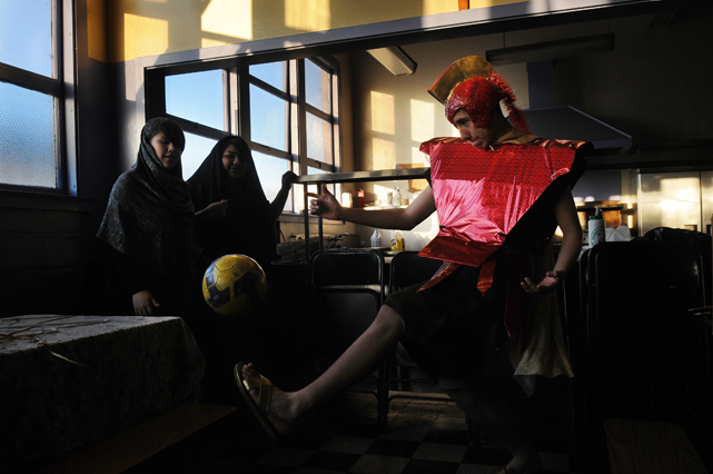 Osmar Serrano, 17, plays soccer before a passion play at St. Gertrudes Church in Stockton CA Thursday April 10, 2009.