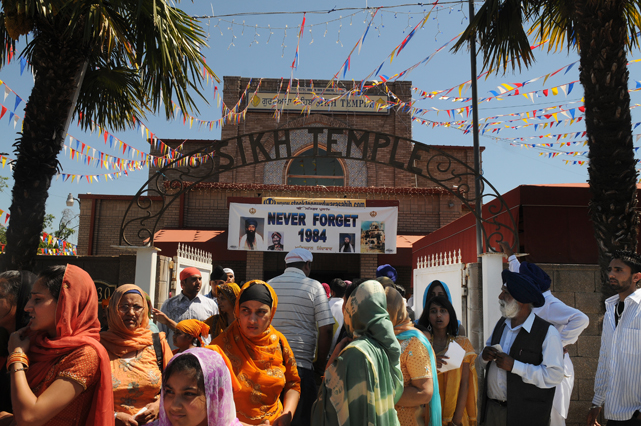 Sikh faithful gather at the Stockton Sikh Temple before the start of the 11th annual Sikh parade.